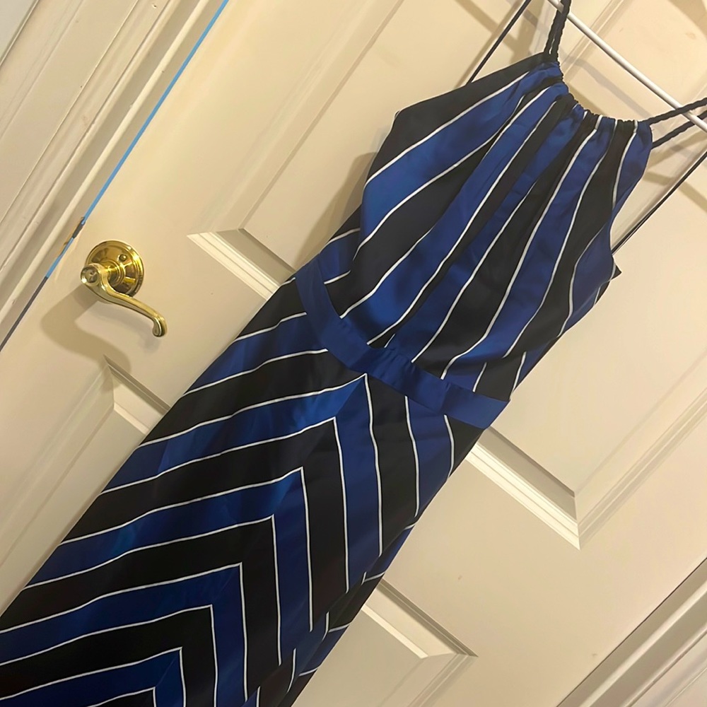 Gorgeous silky soft poly. Tags. Brand new. Blue, white and black stripe. Sz 4